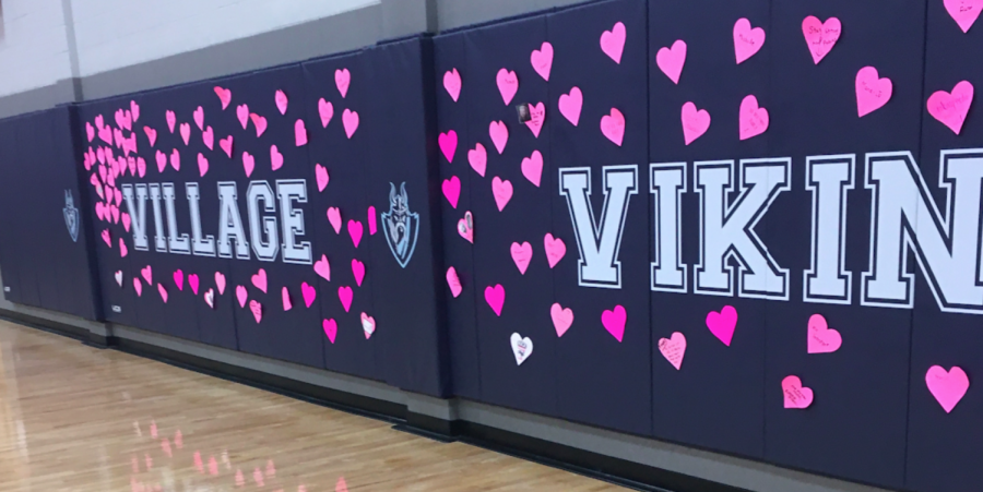 Wall of hearts in the Village Athletic Center, representing those affected by cancer.
