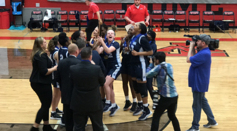 The Village School’s Girls’ Basketball team celebrating their championship win
