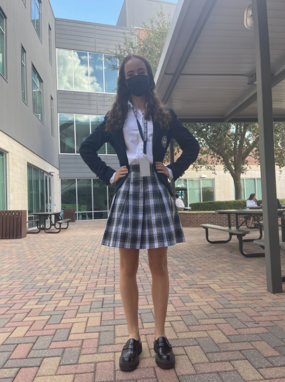 Sophomore Solemei Scamaroni pictured on the patio wearing her dress uniform. 