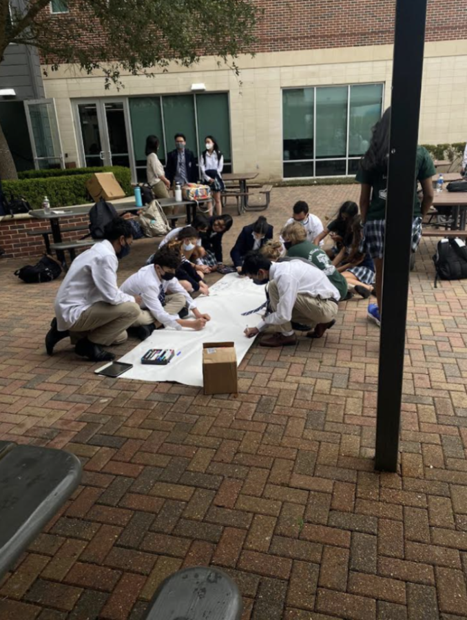 Thor students creating a piece of art with their fellow house members.
Photo taken by Zixin Wang (11).