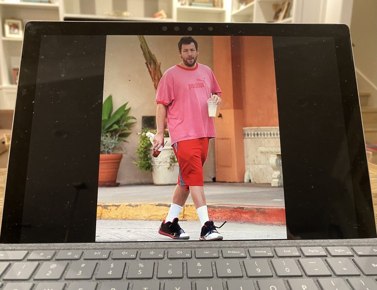 Image of Adam Sandler on a student’s laptop