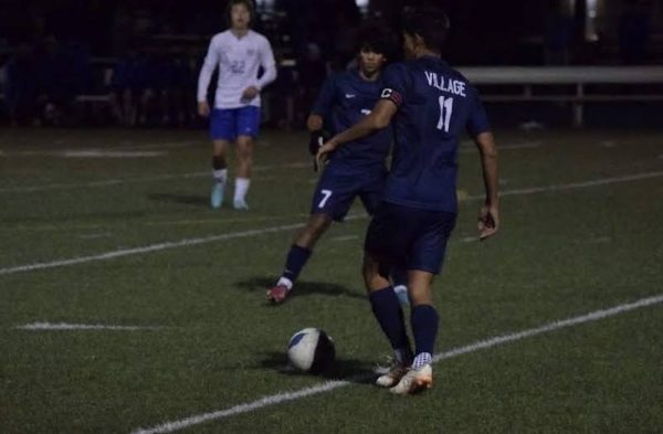 Samuel Lozano (#11) and Richie Leppington (#7) seen playing against the Episcopal Knights. Photo taken by Viking Media