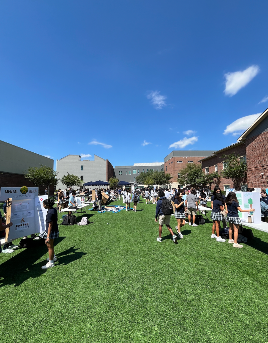 A photo of clubs’ leadership setting up their posters for the club fair