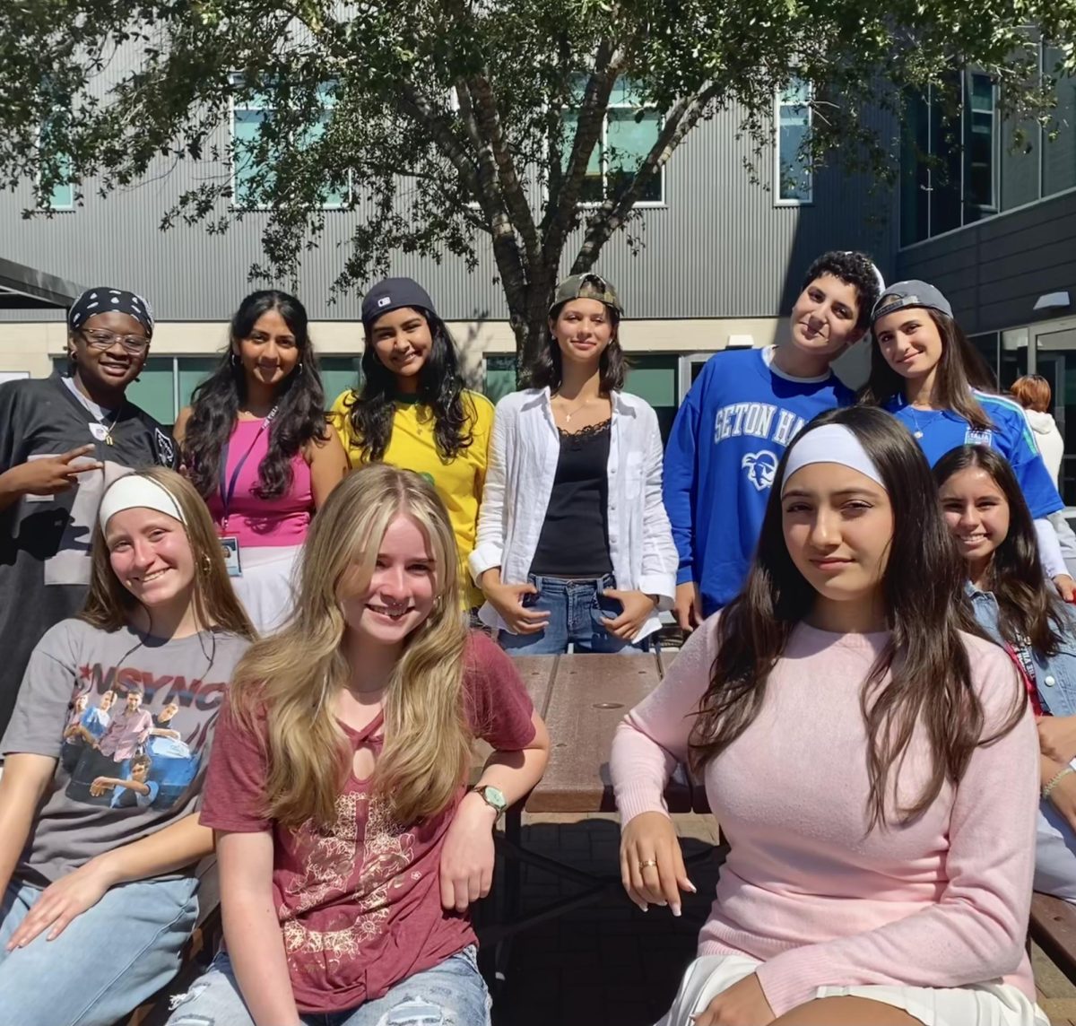 A group of students each with a unique expression of the 90’s and 2000's styles. 