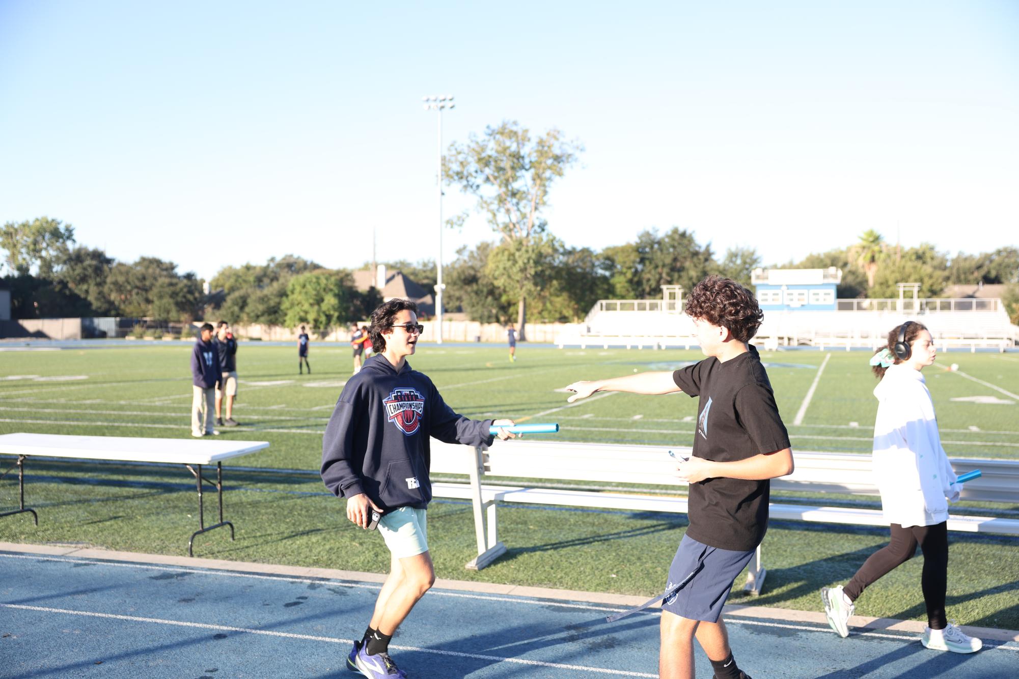 Juniors Kishan Patel and Lorenzo Blenda mid-relay. 