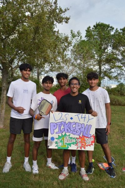 L2S members Ivan Jose, Skandha Krishnan, Srithan Fahim, and Kush Vijapure posing for a picture at the L2S Pickleball Tournament, a charity tournament that raised funds to aid refugees with surgeries for their disabilities!