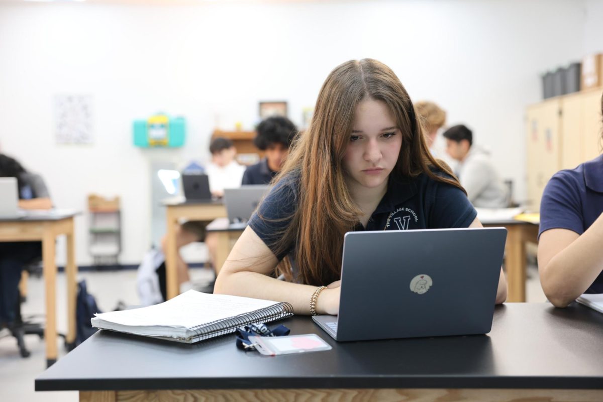 LOCKED IN. Sabrina Schmidt Martinez (11) conducts independent study for her IB ESS HL class on September 25, 2025. Her diligence exhibits the tenacity new IB students have in studying for the IB program.
