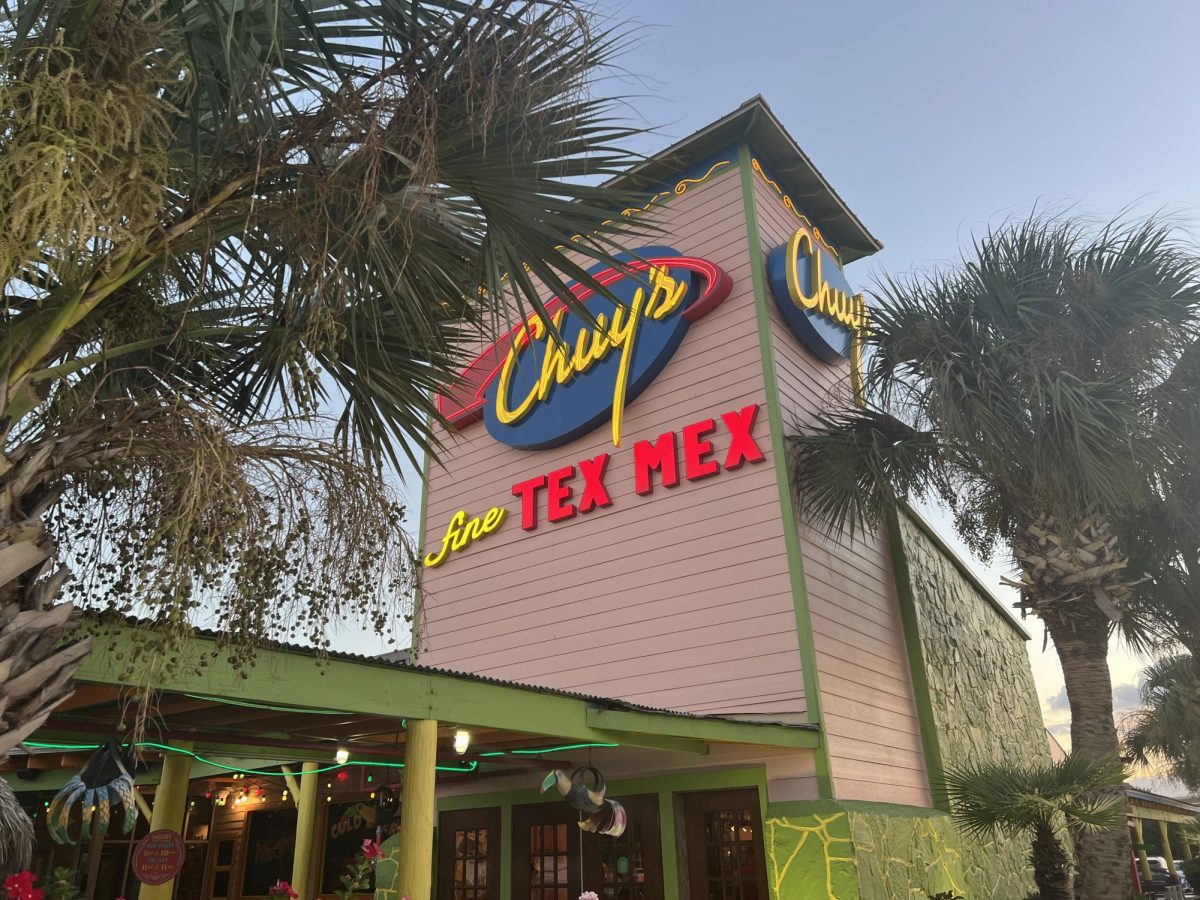 This photo showcases the lively exterior of Chuy’s Tex Mex, located at 19827 Northwest Freeway in Houston, Texas. Known for its colorful walls, and fun, inviting colors. 