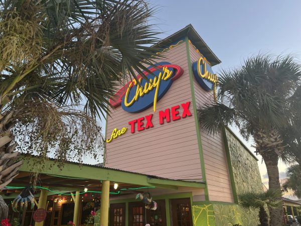 This photo showcases the lively exterior of Chuy’s Tex Mex, located at 19827 Northwest Freeway in Houston, Texas. Known for its colorful walls, and fun, inviting colors. 